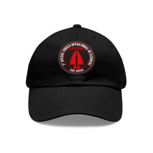 May include: Black baseball cap with a red and white patch that reads "1st Special Forces Operational Detachment Airborne Fort Bragg".