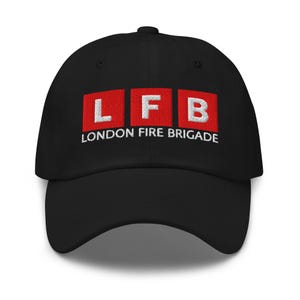 May include: Black baseball cap with the embroidered text "LFB" in white letters inside three red squares, with "LONDON FIRE BRIGADE" embroidered below. The cap has a curved brim and a top button.