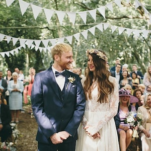 Elevate your Bohemian Woodland Wedding with 60ft of White Fabric Bunting Flags. Perfect for Vintage-Inspired, Cottagecore Special Events