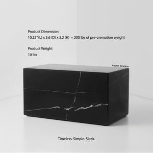 May include: A black rectangular box with white veining. The product dimensions are 10.25" (L) x 5.6" (D) x 5.2" (H). The product weight is 10 lbs. The text "Timeless. Simple. Sleek." is at the bottom.