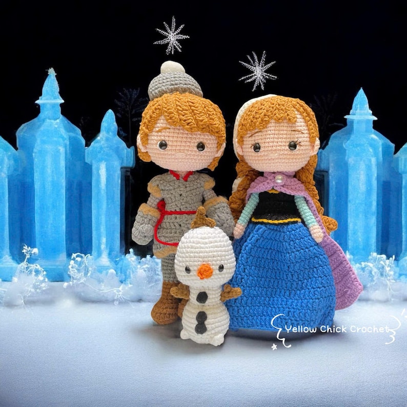 May include: Crocheted dolls of characters from the animated film "Frozen", including Anna, Kristoff, and Olaf. Anna wears a blue dress with a black bodice and purple cape. Kristoff is in a gray outfit, and Olaf is a white snowman.