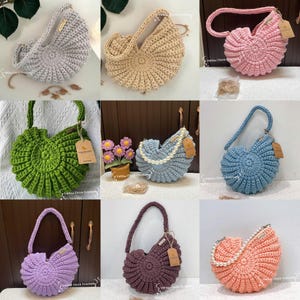 May include: A collection of handmade crochet handbags in various colors, including gray, beige, pink, green, blue, purple, and peach. Each bag features a unique shell-like design with a handle. Some bags have pearl accents.