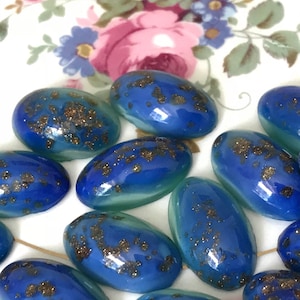 Vintage moonstone gold dust cabochons in Capri blue and opaque green, Glass Cabochons, Oval, 17/10 Domed top, flat Back, Rare