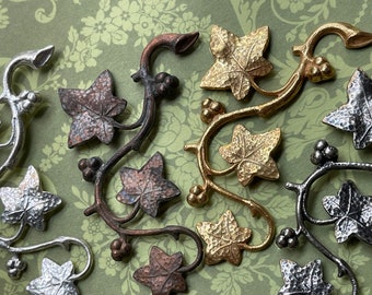 Miriam Haskell brass Stamping, 1 1/2" x 1 1/4,  VINTAGE, floral motif, 2pcs