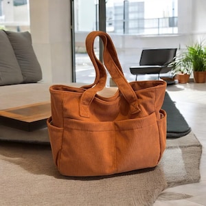 Sac à bandoulière en velours côtelé pour femme avec fermeture éclair, poignée sur le dessus, sac multi-poches uni pour les voyages et le travail