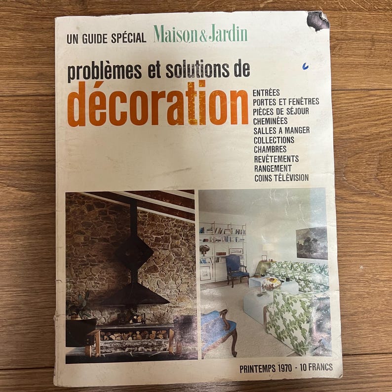 May include: A vintage French magazine cover titled "Probl&egrave;mes et solutions de d&eacute;coration" with a photo of a stone fireplace and a living room interior. The magazine cover also includes the text "Maison & Jardin" and "Printemps 1970 - 10 Francs".