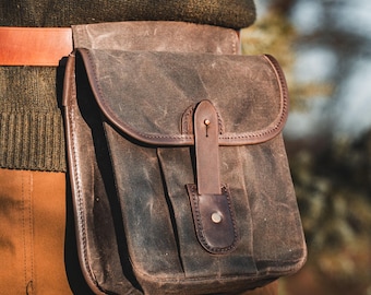 Riemetui van gewaxt canvas voor buiten