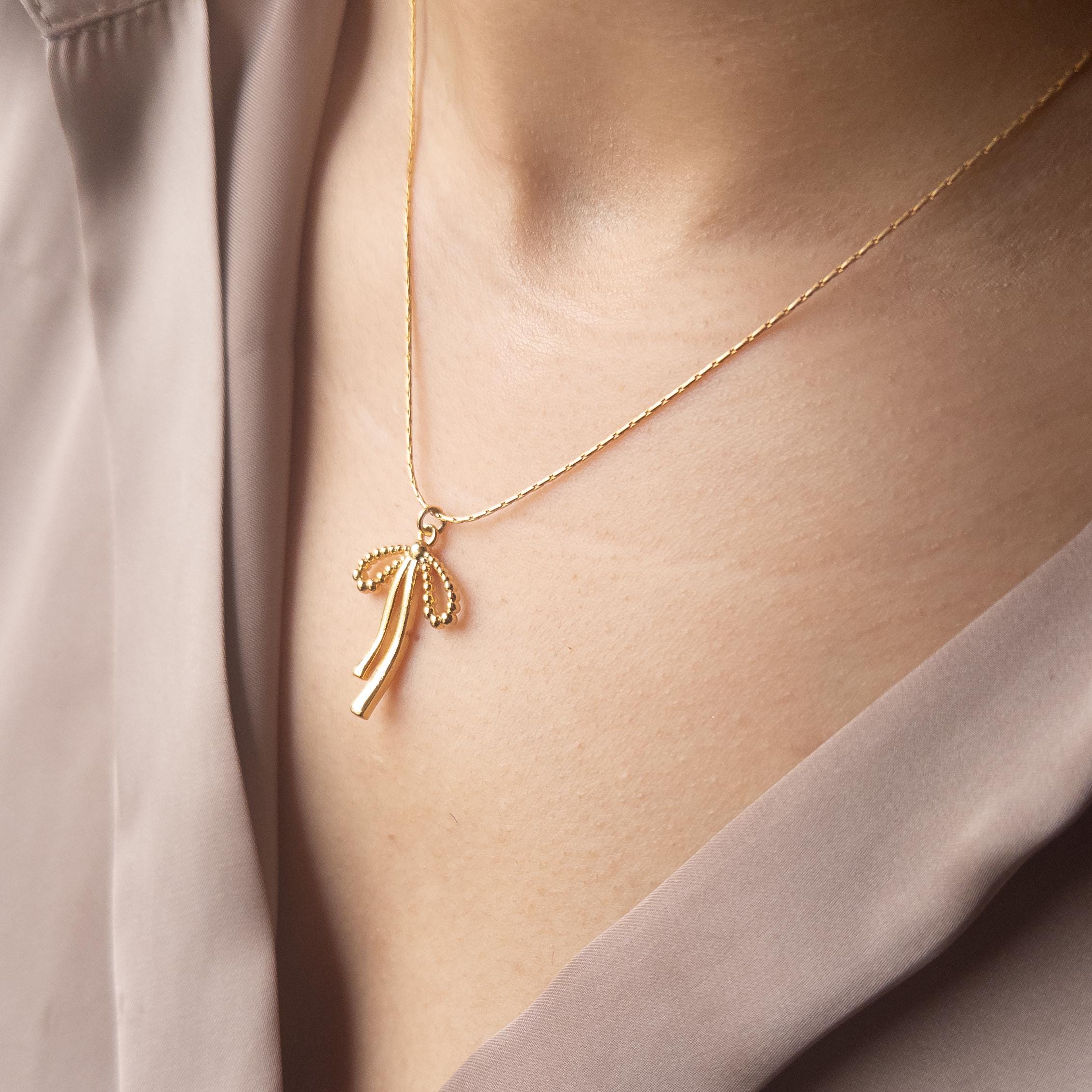 Collana con fiocco Coquette , Collana girocollo con fiocco Coquette , Collana girocollo Coquette , Collana coquette in oro , Placcato oro 14k , Acciaio inossidabile - Italia