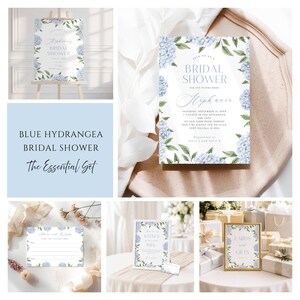 May include: A bridal shower stationery set featuring blue hydrangea floral borders and green leaves. The collection includes an invitation, a wishes card, and signage for cards and gifts, all printed with elegant serif and script typography.