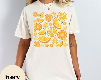 T-shirt sinaasappels, T-shirt citrus splash, T-shirt levendig fruit, cottagecore zomerfruitshirt, handgetekende top met comfortkleuren lentefruit
