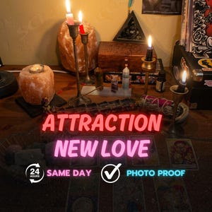 May include: A dimly lit scene featuring candles, crystals, and tarot cards. The words "ATTRACTION" and "NEW LOVE" are illuminated in neon. Additional text includes "SAME DAY" and "PHOTO PROOF".