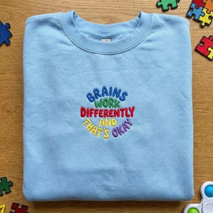 Embroidered Brains Work Differently Sweatshirt, Neurodiversity Awareness Hoodie, Autism ADHD Support Gift, Inclusive Teacher Pullover