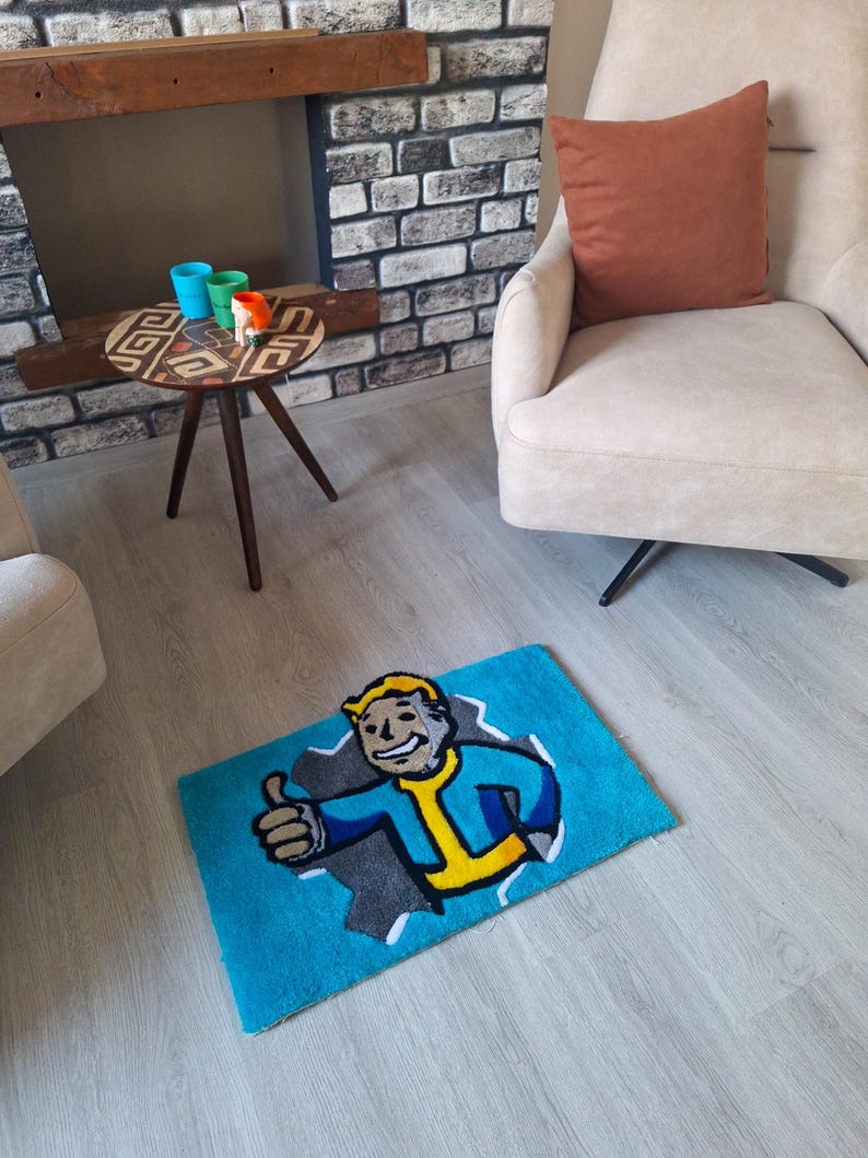 May include: A blue rug with a cartoon character on it. The character is a man with yellow hair, a blue jumpsuit, and a yellow undershirt. He is giving a thumbs up. The rug is on a wooden floor.