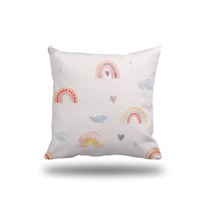 May include: A white pillow with a colorful rainbow pattern. The pillow features multiple rainbows with pink, orange, yellow, green, blue, and purple colors. The rainbows are accented with small hearts and clouds.