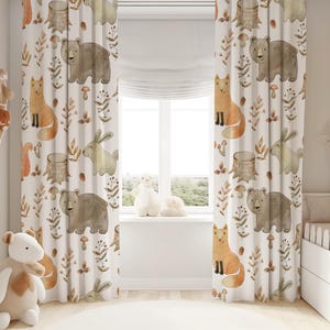 May include: White curtains with a woodland animal print featuring foxes, bears, and rabbits. The animals are illustrated in watercolor style with brown, orange, and green accents.