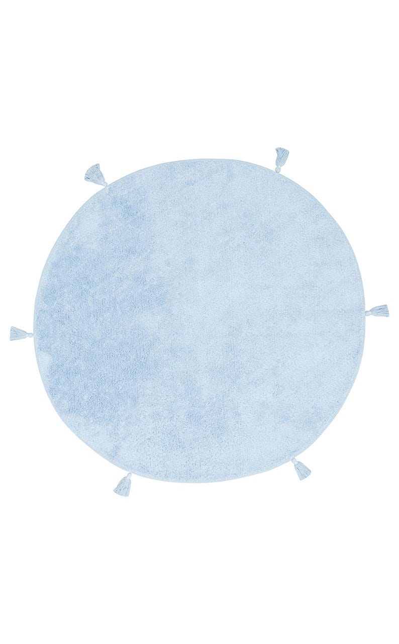 May include: A light blue round rug with tassels around the edge.