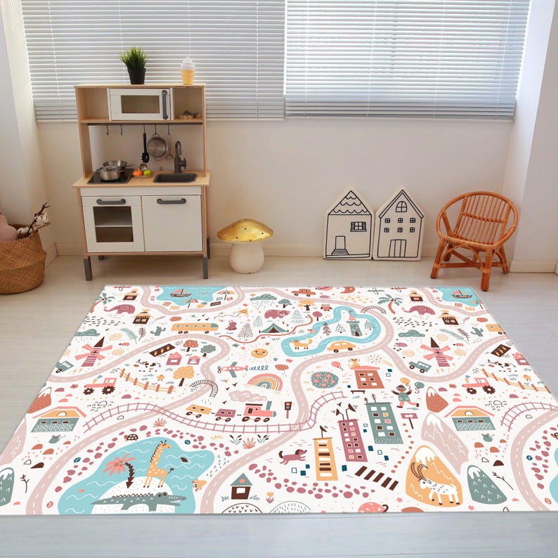 May include: A colorful play mat with a road, houses, animals, and other fun elements. The mat is perfect for kids to play on and learn.