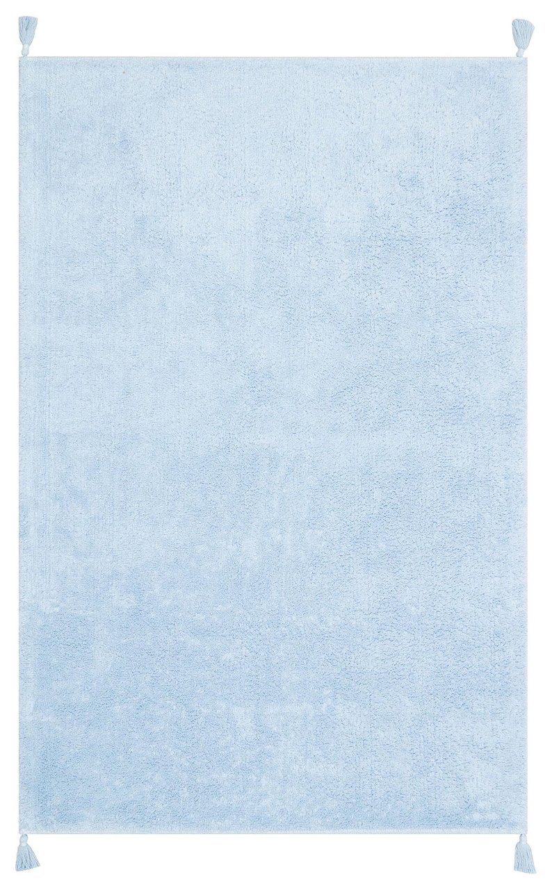 May include: A light blue shag rug with tassels on each corner.