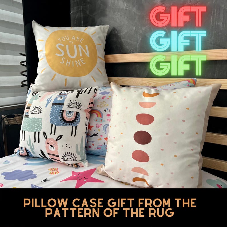 May include: Three pillowcases with different patterns. The first pillowcase is white with a yellow sun and the text "You are my sun shine". The second pillowcase has a white background with a colorful llama pattern. The third pillowcase has a white background with a pattern of pink, brown, and orange circles. The text "Pillow case gift from the pattern of the rug" is at the bottom of the image.