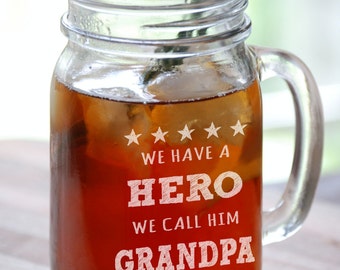 We have a Hero We Call Him Grandpa Fathers Day Gift Engraved Mason Jar Drinking Beer Mug Glass Etched Grandfather Papa Poppa Grandkids