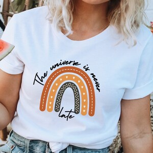 MANIFEST SHIRT, Positive Message Tee, UNIVERSE Gifts, Universe Is Never Late Rainbow Graphic Inspiration Quote Print Unisex Spiritual Tee
