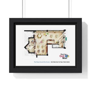 May include: Framed print showing a detailed floor plan of a shop, with tables, chairs, and fixtures. The print includes the text "You've Got Mail" and "The Shop Around the Corner - 106 West 69th St, New York, 10023."