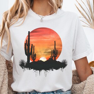 Koszulka „Desert Sunset”, bluza „Cactus Scene Adventure”, koszulka „Plant Lady”, koszulka „Wonder Woman”