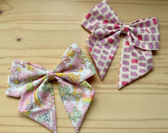 Hair bows in whimsical prints - Care Bears, gummy bears