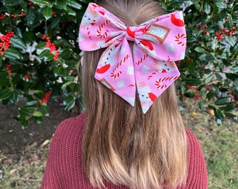 Holiday hair bow in fun Christmas prints - Santa Claus, hot chocolate, mistletoe-Rifle Paper Co fabric.