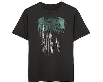 May include: Black t-shirt with a distressed graphic. The design features the text "NOCTURNAL SILENCE" above a detailed illustration of a gothic cathedral. The text and graphic are in teal and white.