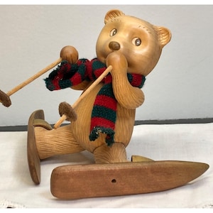 Robert Raikes Series Wooden Skiing Bear With Red & Green Knit