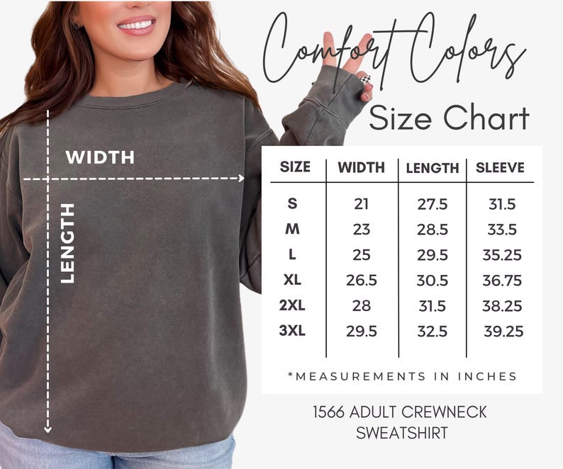 May include: A size chart for a Comfort Colors 1566 adult crewneck sweatshirt. The chart shows measurements in inches for sizes S to 3XL. The sweatshirt is a muted green color. The text "Comfort Colors" is at the top.