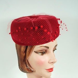 Early 1960s Red Velvet Pillbox hat by Mr John With Dotted Chenille Veiling