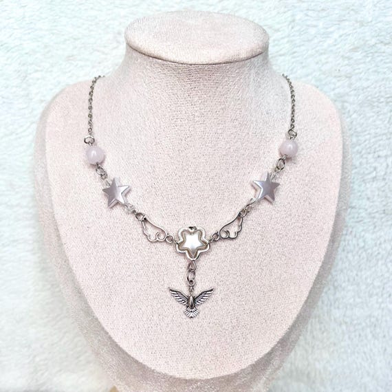 Collana di uccelli in argento, medaglione di uccelli in