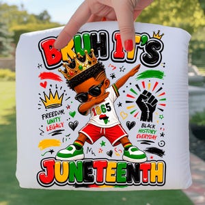May include: White pillow with a colorful Juneteenth design. The design features a cartoon boy wearing sunglasses and a crown, dabbing. Text includes "Bruh It's Juneteenth", "Freedom, Unity, Legacy", and "Black History Everyday".