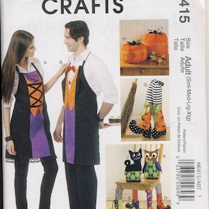 May include: A sewing pattern for Halloween costumes and decorations. The pattern includes instructions for making a witch's apron, a pumpkin, a witch's legs, and an owl. The pattern number is M6415.