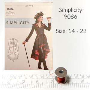 May include: Simplicity sewing pattern number 9086 for a costume. The pattern is for sizes US 14-22. The pattern shows a woman wearing a black and red jacket with a high collar and a high-low hemline. The jacket has gold buttons and red trim. The woman is also wearing black pants and black boots. The pattern is on a white background.