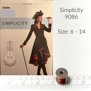 May include: Simplicity sewing pattern number 9086 for a costume. The pattern includes instructions for sizes 6 to 14. The image shows a woman wearing a black and red costume with a high-low hemline. She is holding a telescope in her right hand and has a black hat on her head.