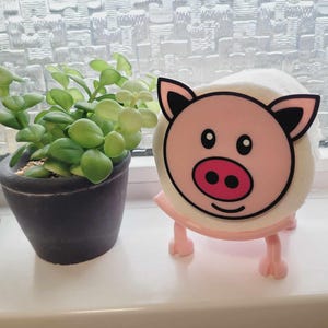 Portarrollos de papel higiénico con un peculiar dibujo de cerdo: accesorio de baño impreso en 3D