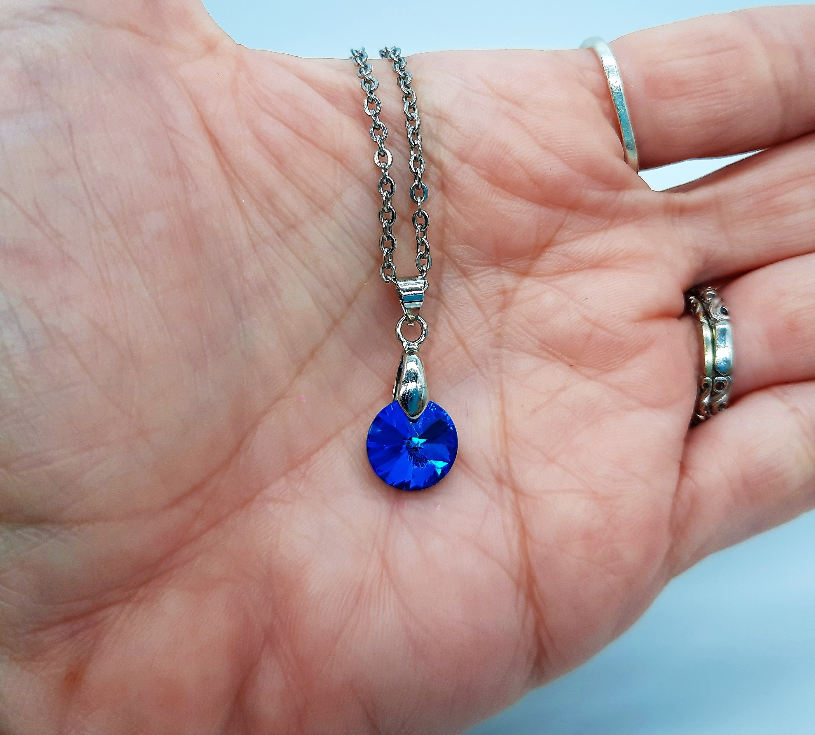 Handcrafted Multifaceted Bermuda Blue Round Glass Rhinestone