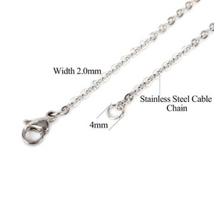 May include: A silver stainless steel cable chain necklace with a lobster clasp. The chain is 2.0 mm wide and 4 mm thick.  Stainless Steel Cable Chain.