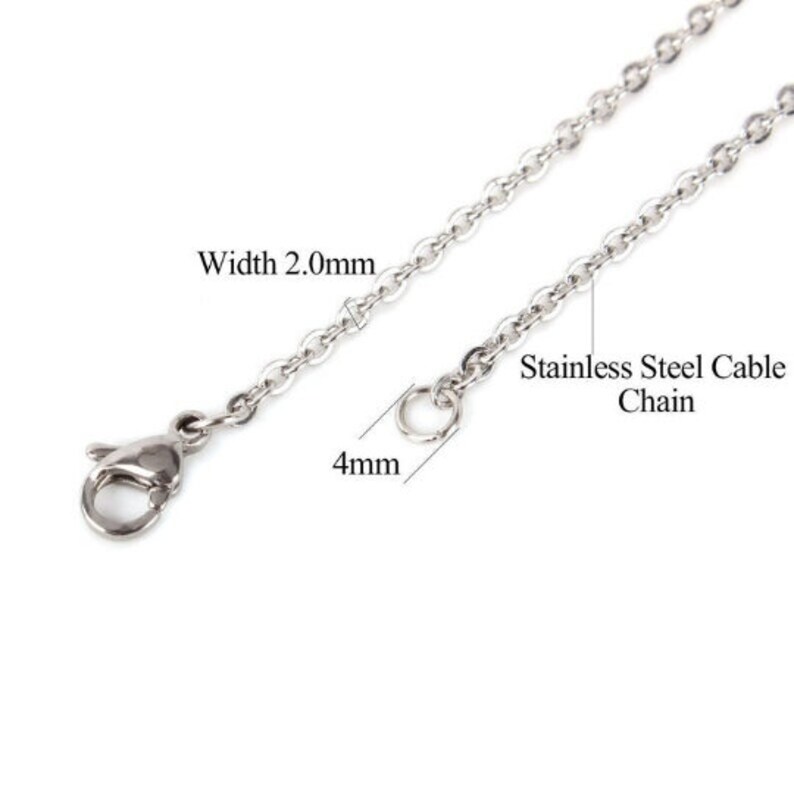May include: A silver stainless steel cable chain necklace with a lobster clasp. The chain is 2.0 mm wide and 4 mm thick.  Stainless Steel Cable Chain.