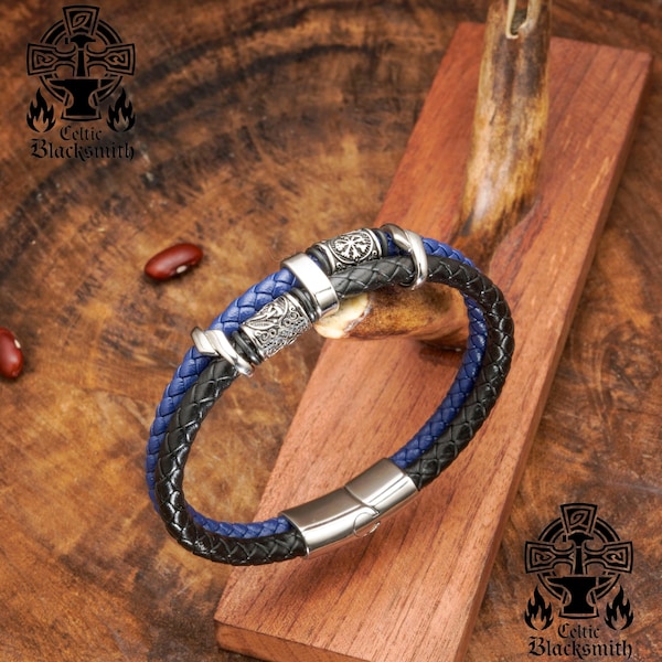 Pulsera trenzada de cuero azul y negro hecha a mano en Midnight Ocean, con dos correas vikingas y cuentas de acero para él, cómoda y ajustable.