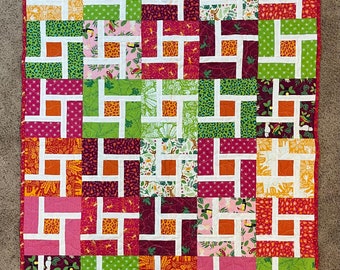 Twist Around Jungle Pink Baby Quilt