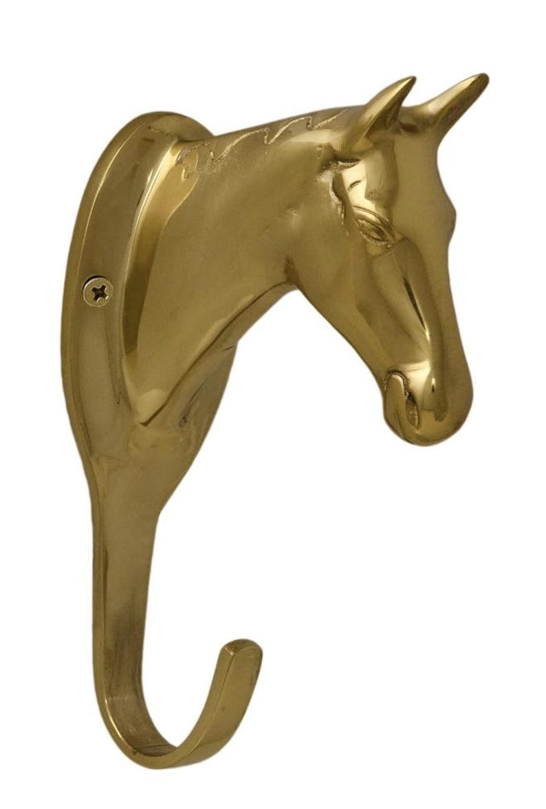 May include: A gold-toned brass horse head wall hook. The hook is shaped like a horse's head with a curved hook extending from the bottom. The hook is designed to be mounted on a wall.