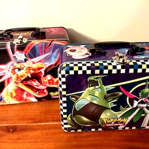 pokemon lunch box with cards Tin Bundle! Silver Tempest, Shield era Pokemon Trading Card Game 25th