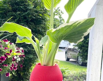 Rode minimalistische 3D-geprinte plantenbak: geribbelde succulente pot met drainage
