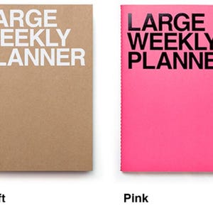 May include: Two large weekly planners, one in kraft brown and the other in bright pink. The words "LARGE WEEKLY PLANNER" are printed in bold white and black fonts. The kraft planner has a minimalist design, while the pink one is more vibrant.