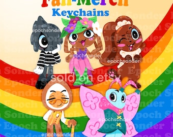 May include: A collection of colorful cartoon keychains. The keychains feature various characters, including a creature in a striped shirt, a bunny with a flower crown, a squirrel, a character with a cane, and a butterfly. The text "Fan-Merch Keychains" is at the top.
