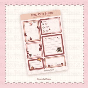 May include: A sheet of functional stickers titled "Cozy Café Boxes." The stickers are in shades of pink and brown, featuring coffee-themed illustrations and text like "menu" and "coffee time." The sheet includes boxes for notes and a menu.